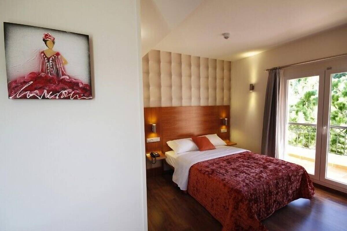 Premium bedding, down duvets, in-room safe, desk