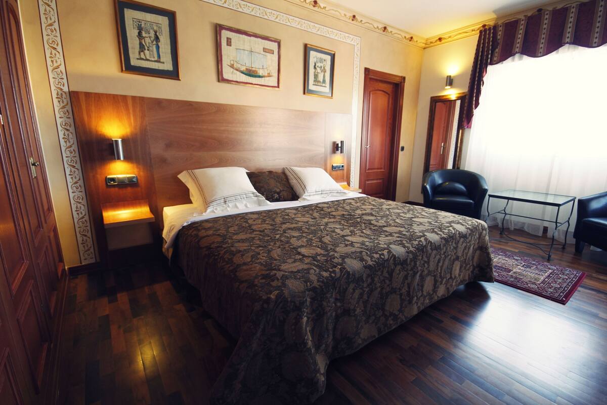 Premium bedding, down duvets, in-room safe, desk