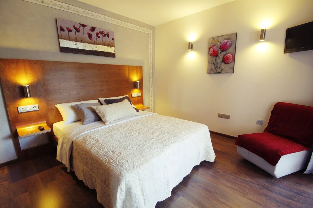 Premium bedding, down duvets, in-room safe, desk