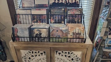 A display of The Duttons' music albums and merchandise in a store.