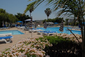 Outdoor pool, pool umbrellas, pool loungers