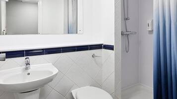 Shower, free toiletries, hair dryer