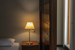 Family Quadruple Room | Minibar, in-room safe, desk, free cribs/infant beds