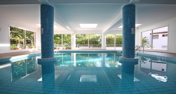 Indoor pool, seasonal outdoor pool, pool umbrellas, sun loungers