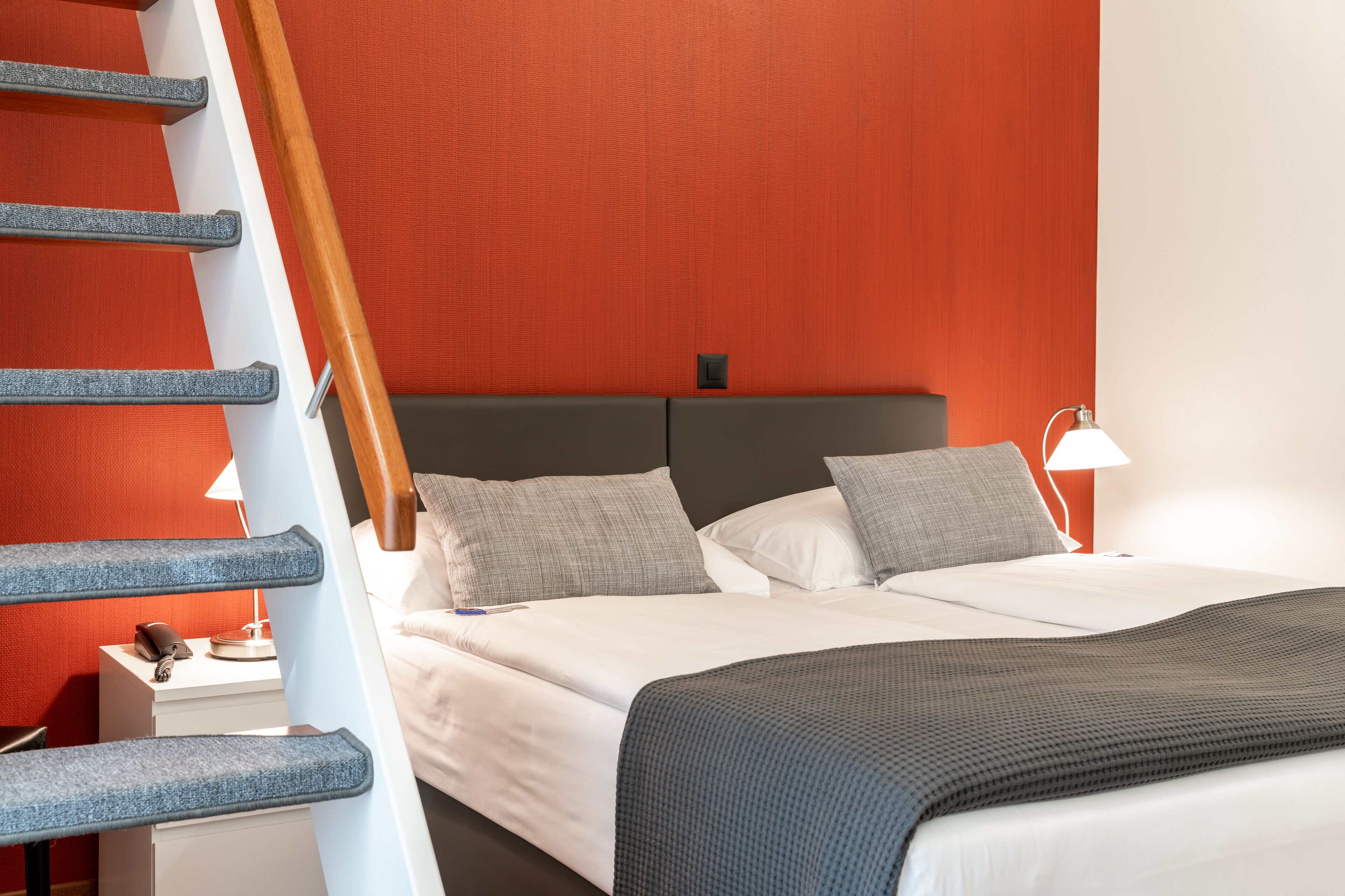 family room | desk, blackout curtains, iron/ironing board, free cots/infant beds