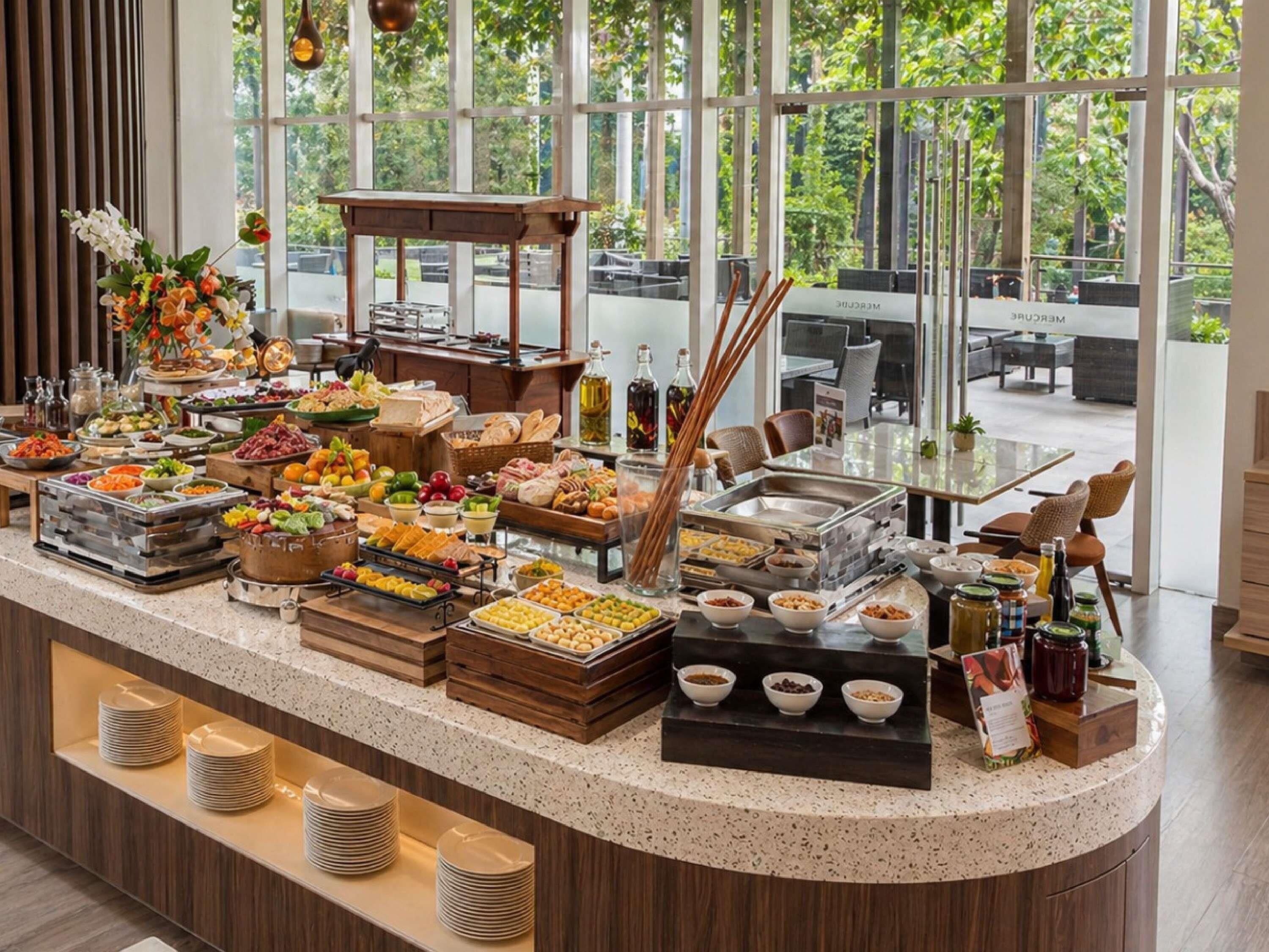 Un bufé con diferentes opciones de comida y una estación de café, todo en un espacio moderno con amplios ventanales.
