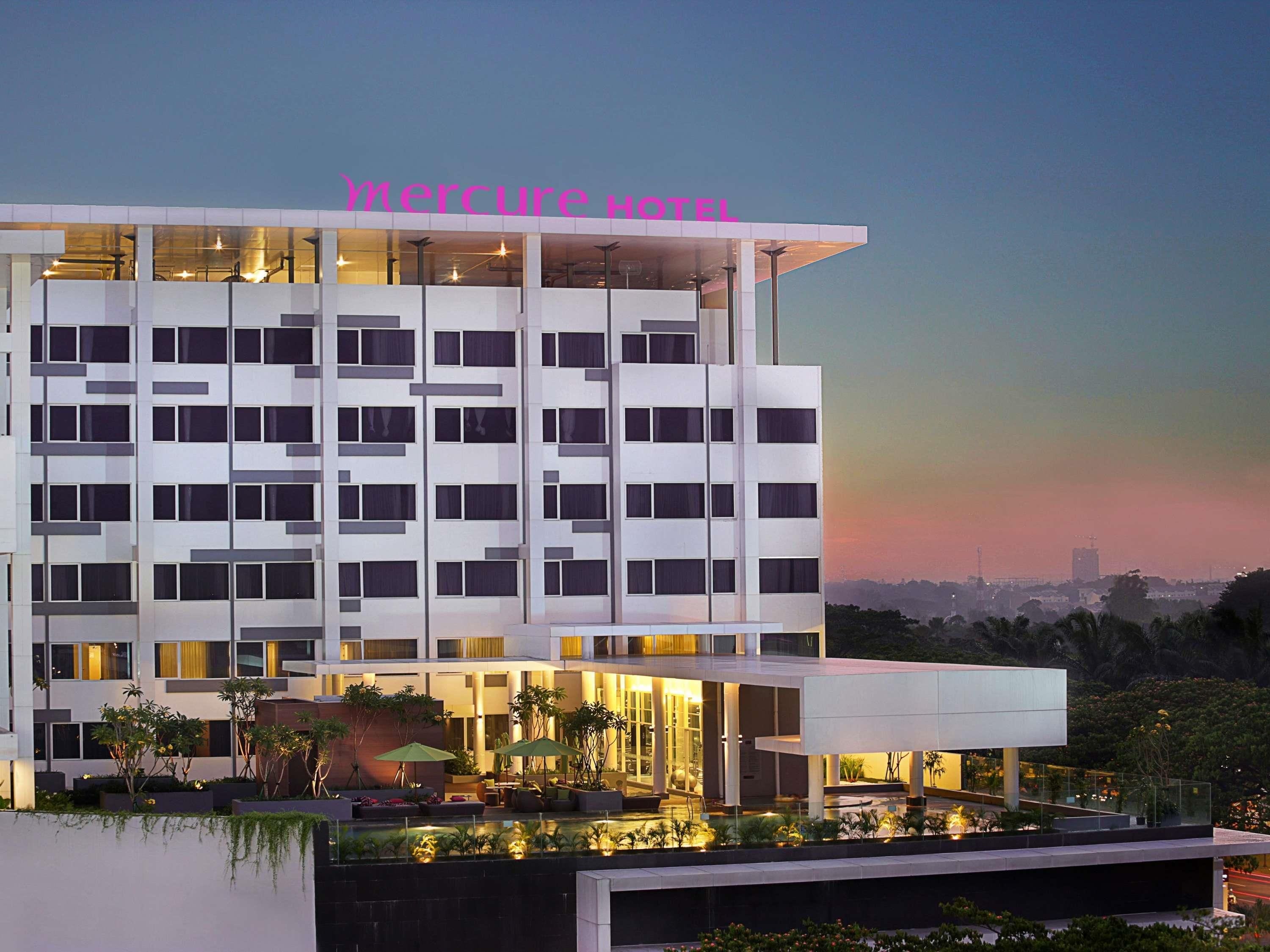 A modern hotel with a clear sign reading 'Mercure Hotel.'