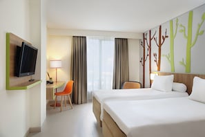 Standard Room, 2 Twin Beds | Premium bedding, pillowtop beds, minibar, in-room safe - Grand Livio Hotel (Kuta)