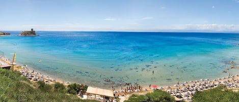 Private beach, sun-loungers, beach umbrellas, beach bar