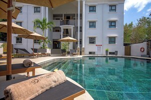 Outdoor pool, pool umbrellas, sun loungers