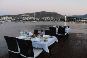 Lunch, dinner served; local and international cuisine, beach views
