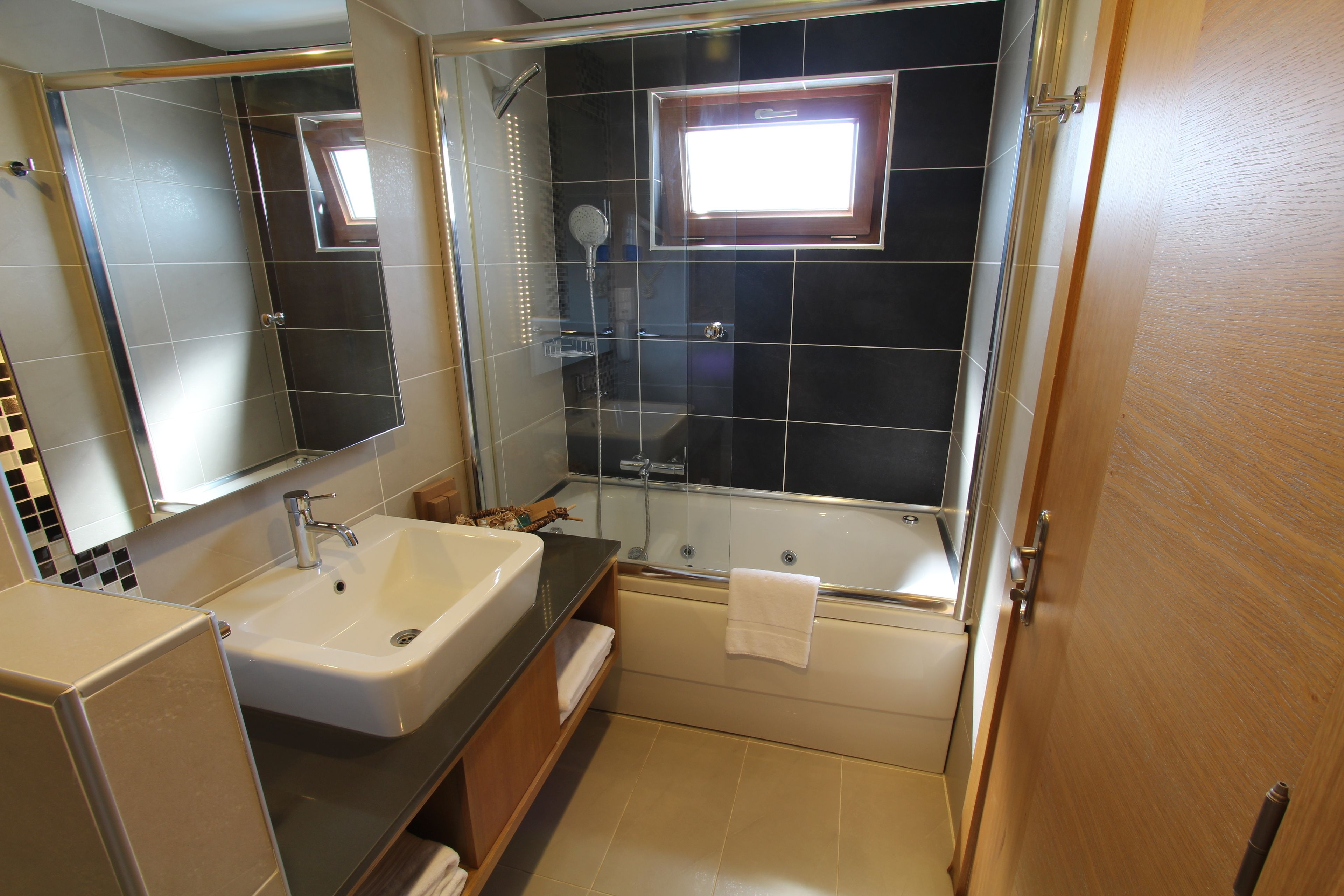 suite | bathroom | rainfall showerhead, free toiletries, hair dryer, slippers