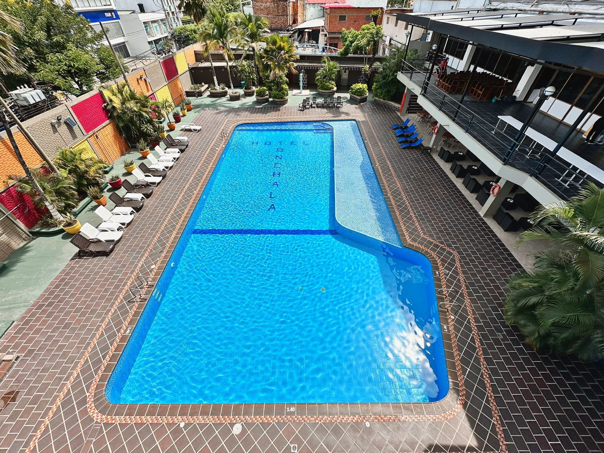 outdoor pool, open 9:30 am to 7:30 pm, pool loungers