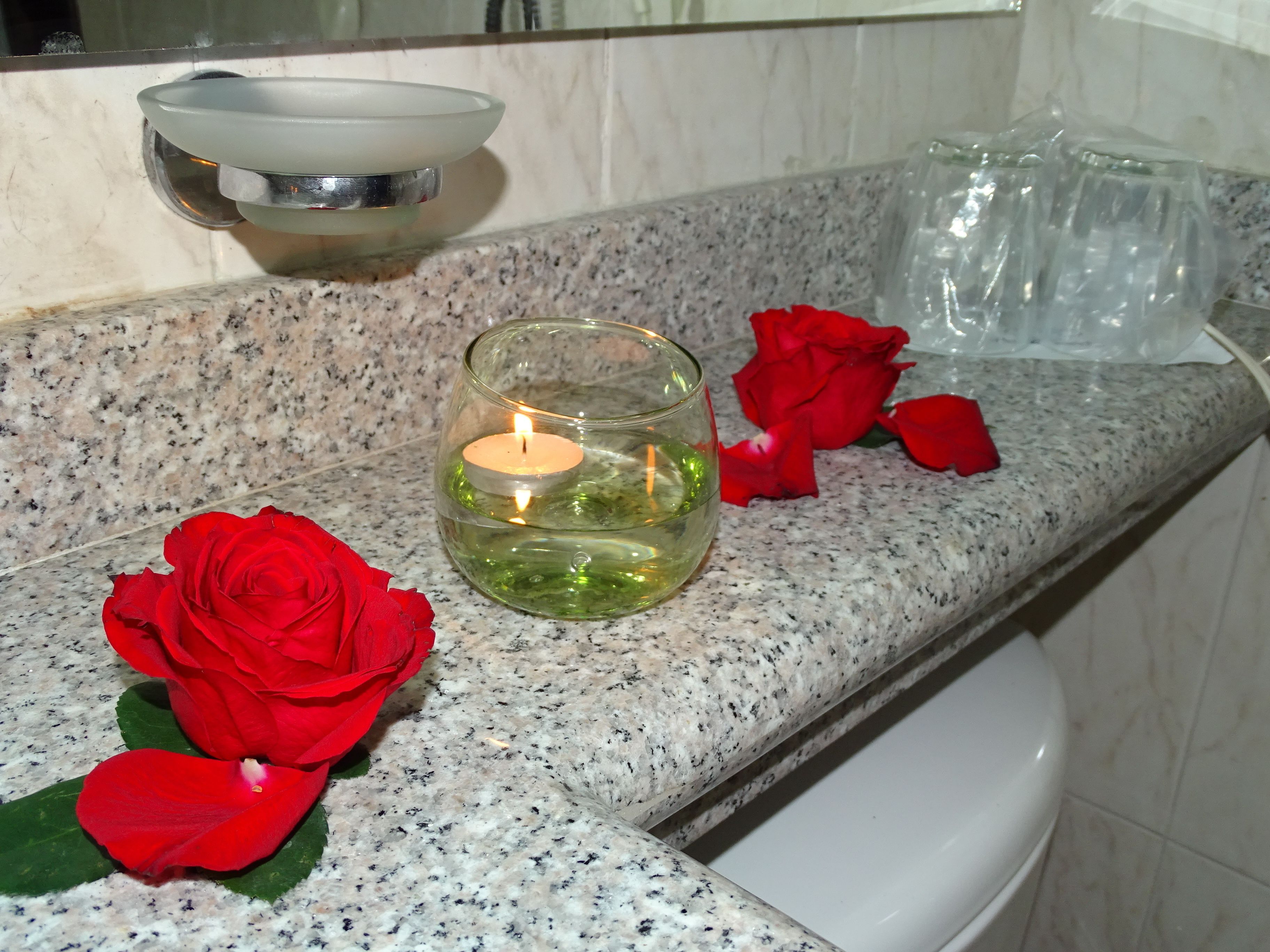 designer toiletries, hair dryer, bidet, towels