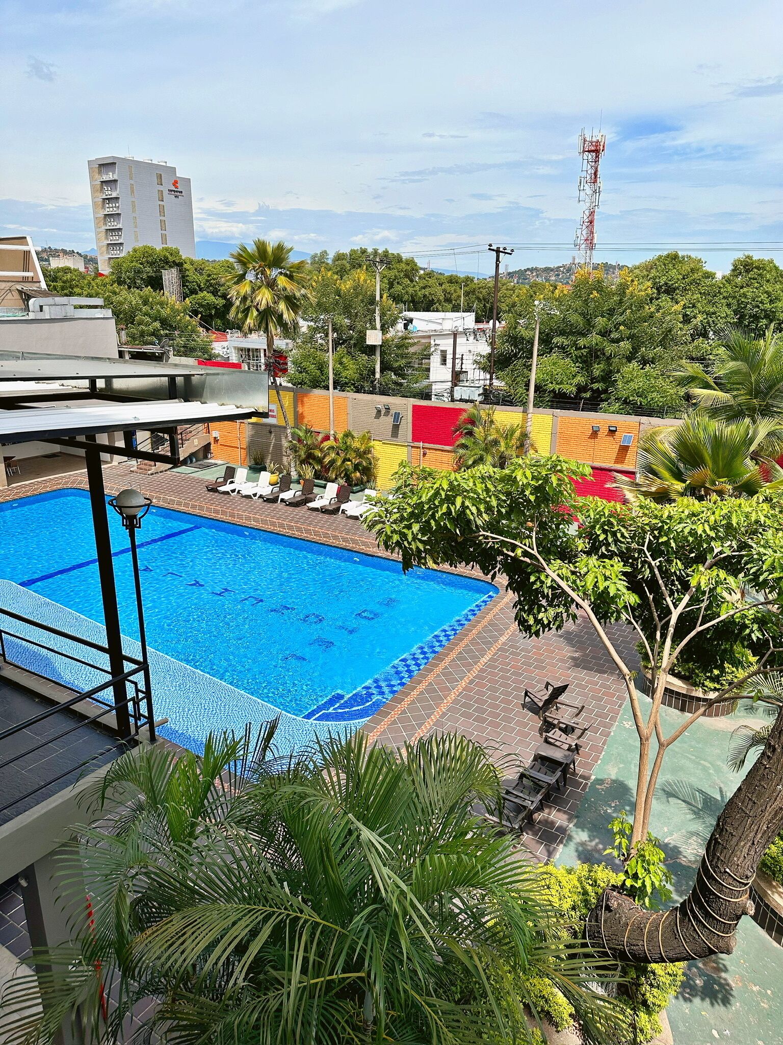 outdoor pool, open 9:30 am to 7:30 pm, pool loungers