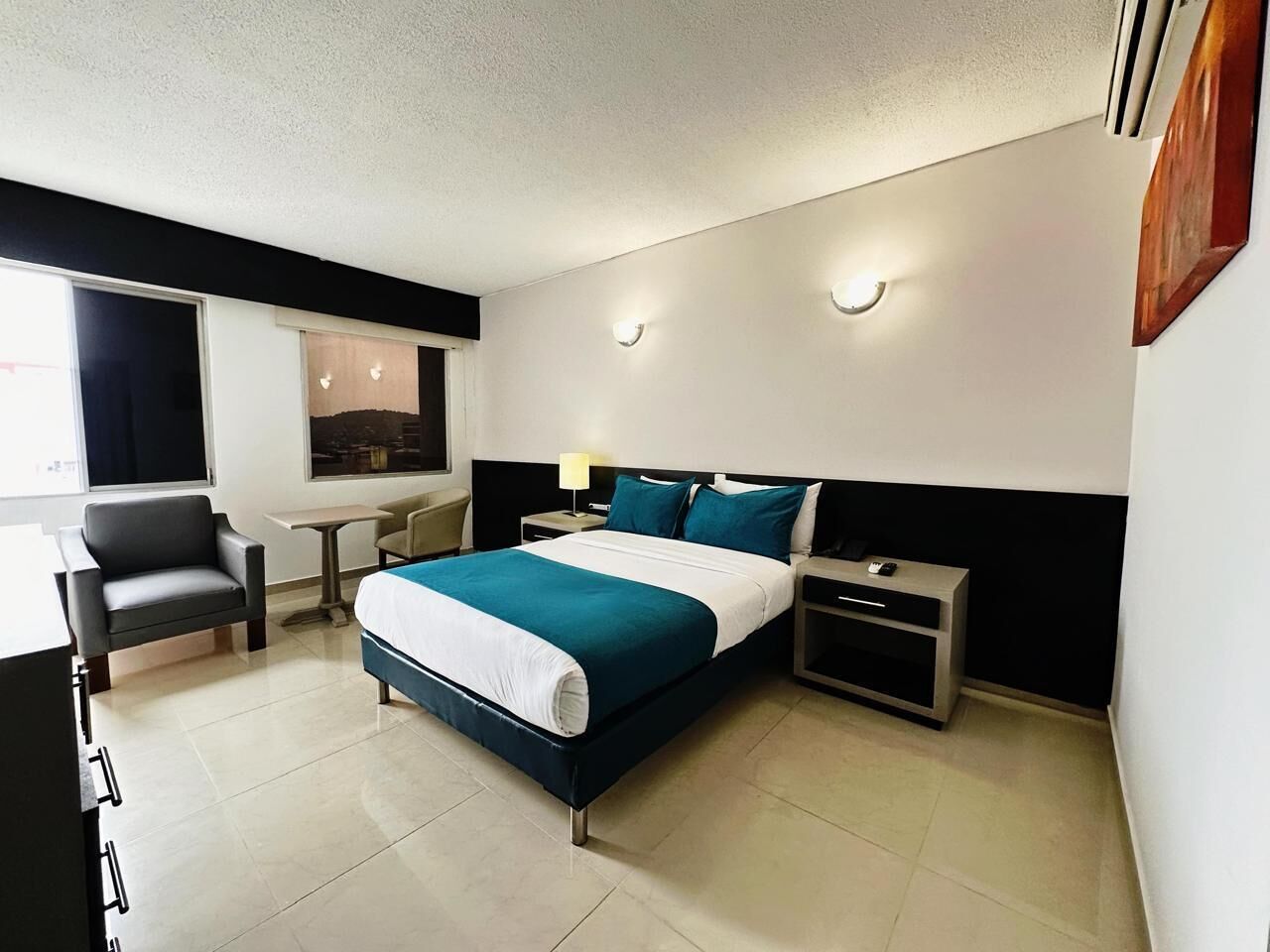 Executive tweepersoonskamer, 1 tweepersoonsbed | Luxe beddengoed, donsdekens, een minibar, een kluis op de kamer