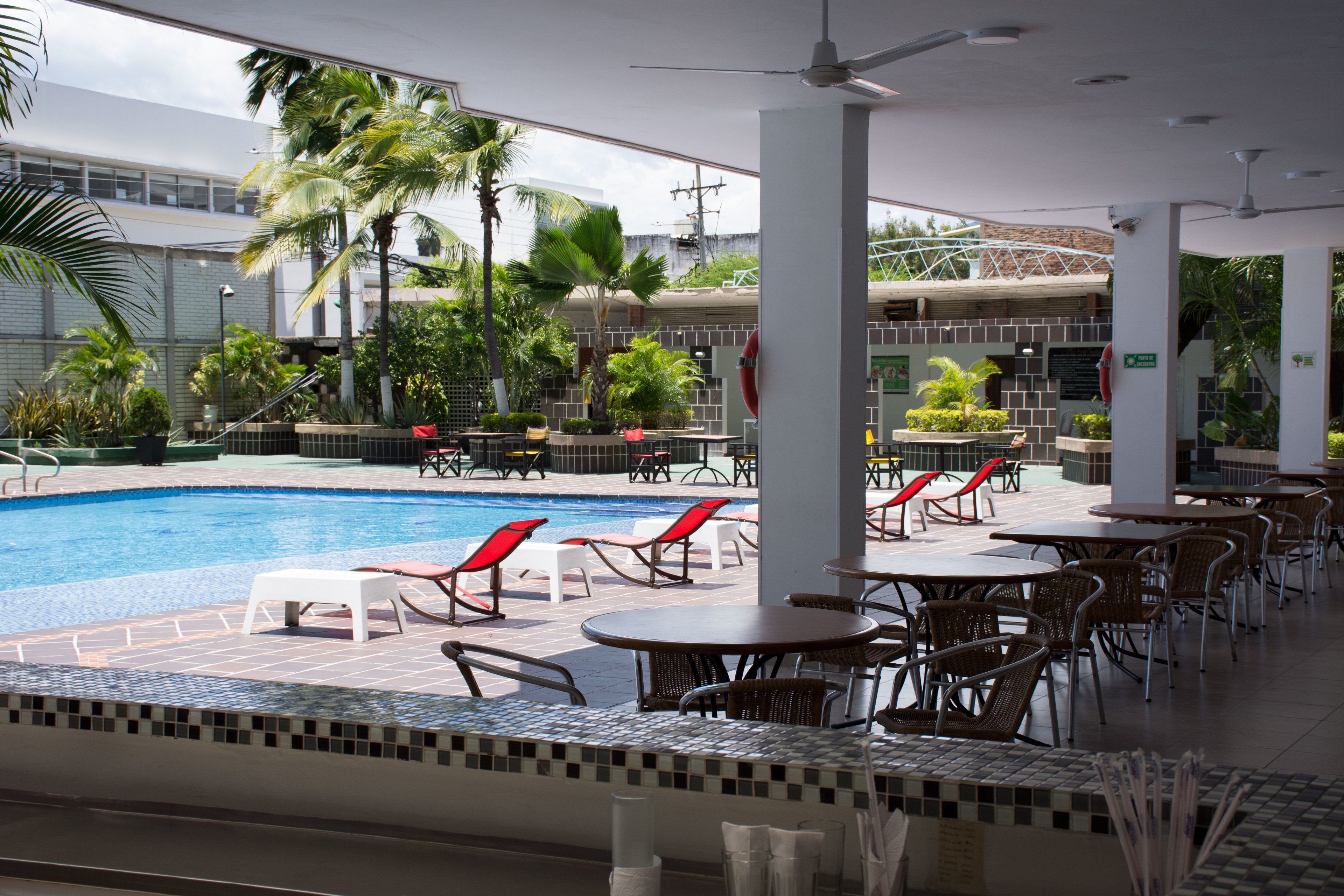 outdoor pool, open 9:30 am to 7:30 pm, pool loungers
