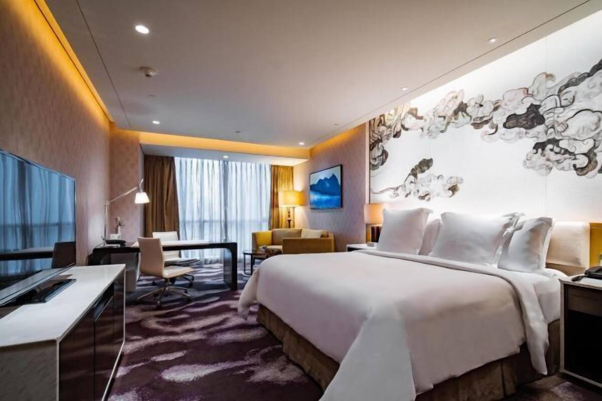 Hypo-allergenic bedding available, down comforters, minibar