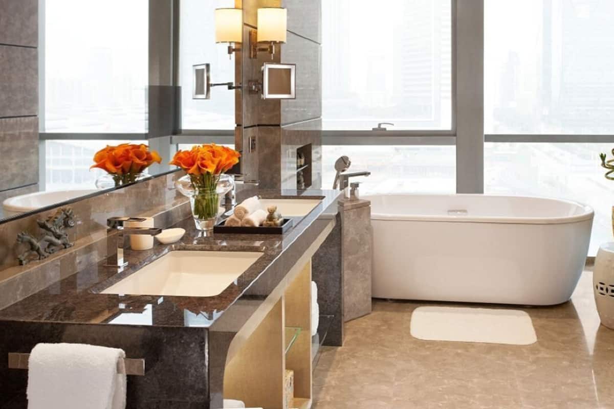 executive suite, 1 king bed | bathroom | separate bathtub and shower, hair dryer, bathrobes, slippers