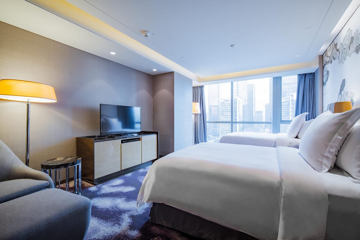 Suite | Hypoallergeen beddengoed, donzen dekbedden, een minibar
