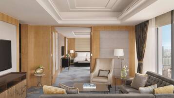 Suite Deluxe, 1 cama de matrimonio grande | Caja fuerte, escritorio, cortinas opacas y sistema de insonorización