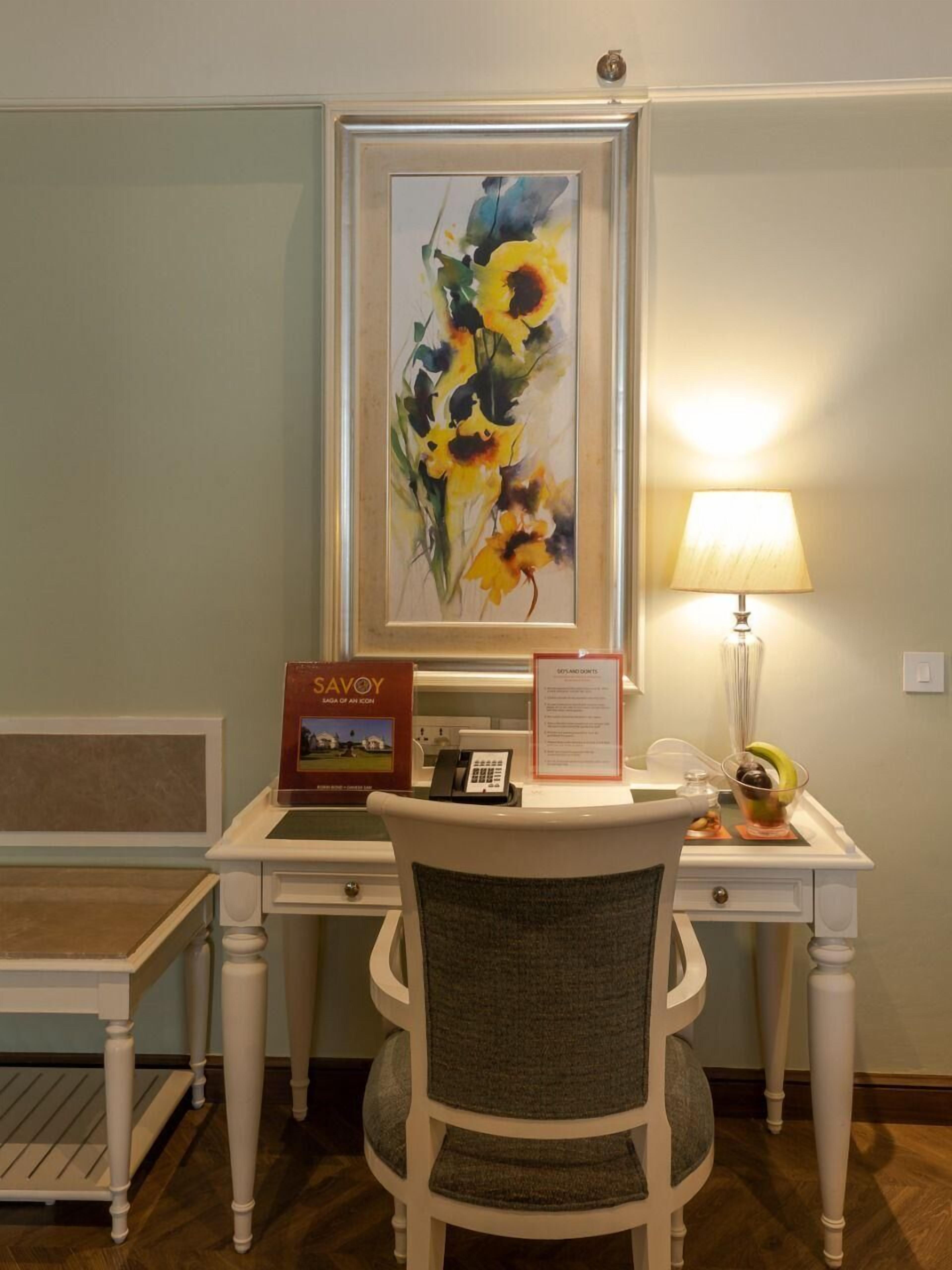 deluxe room, 1 queen bed (premium non view rooms) | premium bedding, minibar, in-room safe, laptop workspace