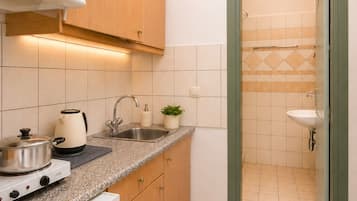 Apartment, 2 Bedrooms | Frette Italian sheets, premium bedding, desk, laptop workspace