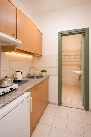 Apartment, 2 Bedrooms | Frette Italian sheets, premium bedding, desk, laptop workspace