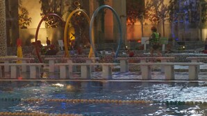 A swimming pool with lane dividers and a water fountain feature. - Ace Hotel & Suites (Pasig)