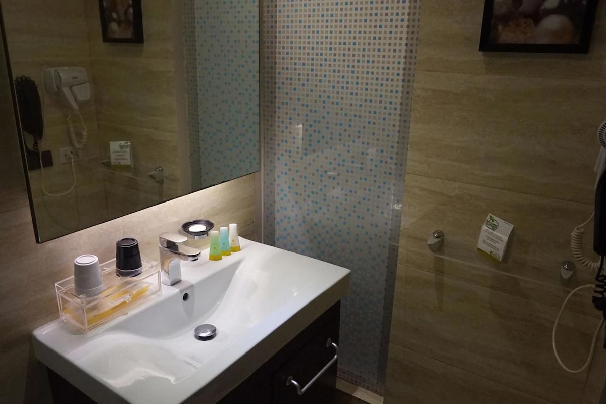 Bathroom | Shower, free toiletries, hair dryer, towels