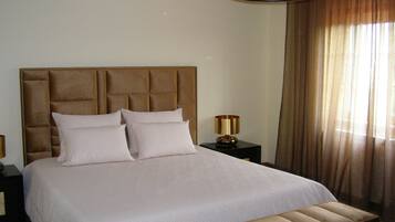 Habitación familiar | Minibar, wifi gratis y ropa de cama