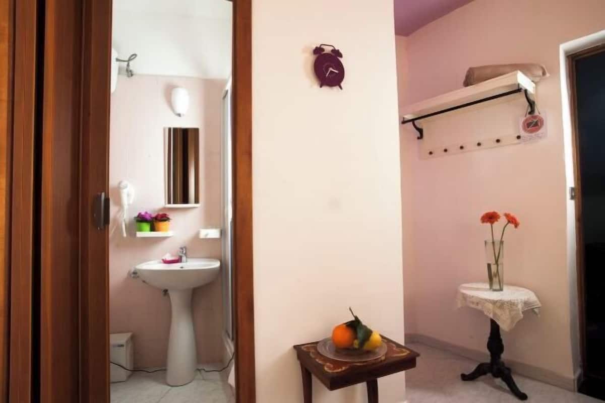 Bathroom | Shower, rainfall showerhead, designer toiletries, hair dryer