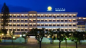 A multi-story hotel with a prominent sign reading "HOTEL MARIANT". - Mariant (Sant Llorenc des Cardassar)