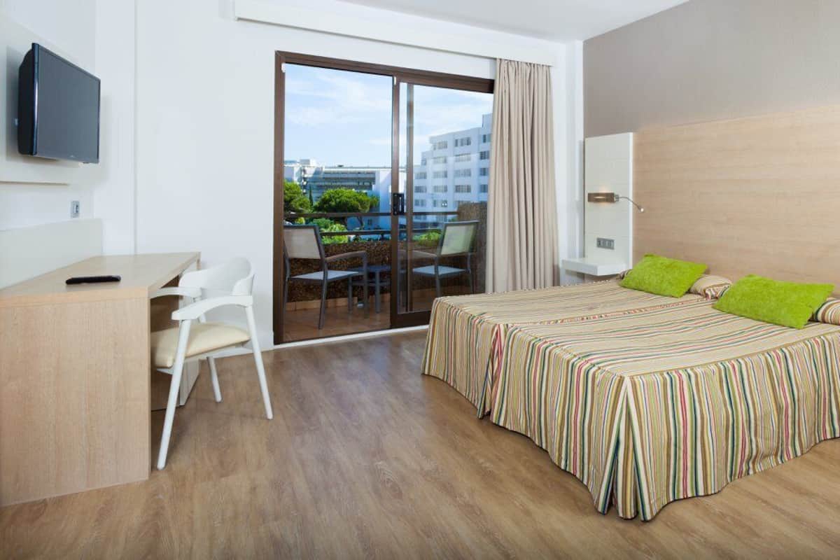 Desk, blackout drapes, iron/ironing board, bed sheets