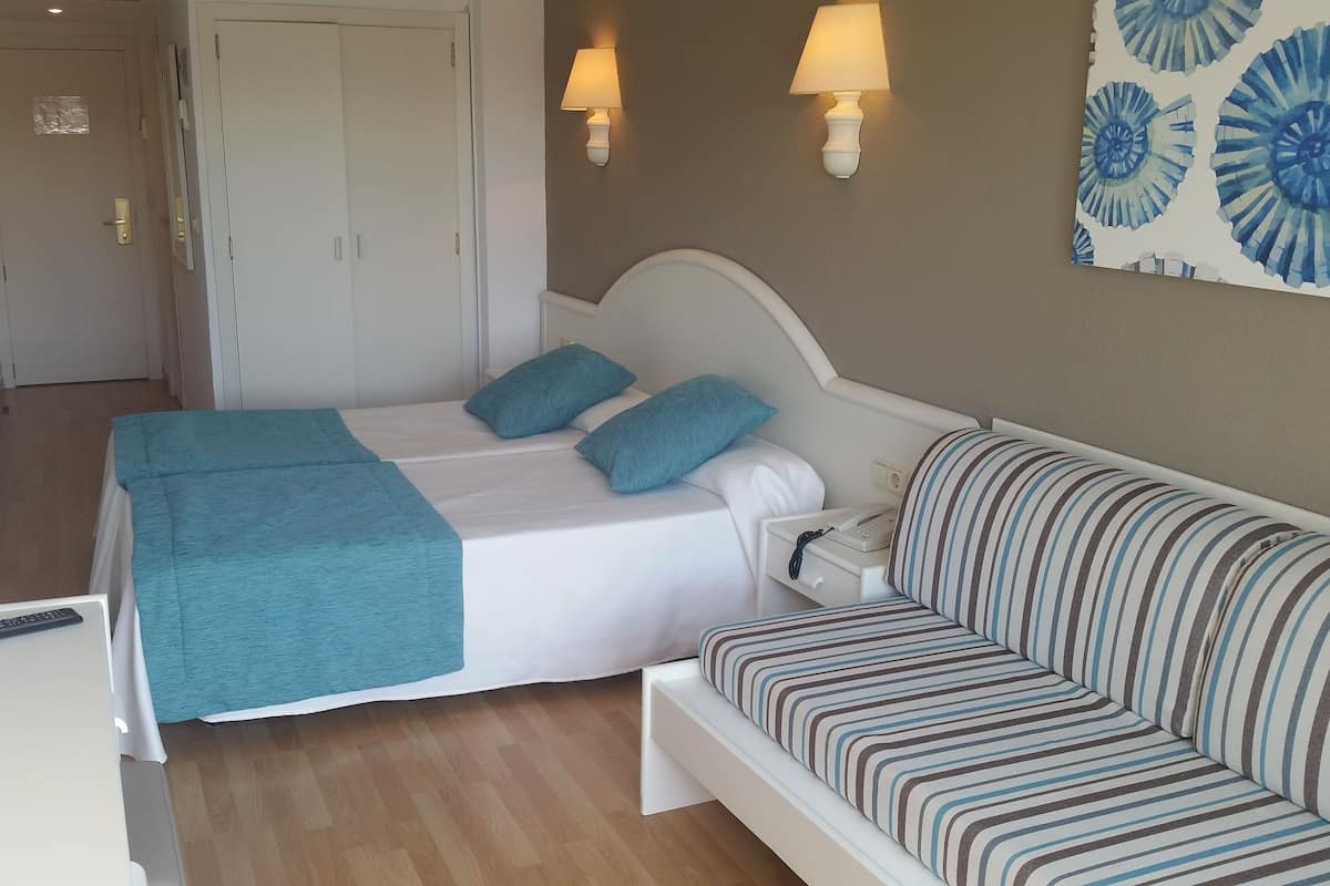 Desk, blackout drapes, iron/ironing board (on request), bed sheets