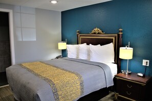 Deluxe Room, 1 Queen Bed | Blackout drapes, iron/ironing board, free WiFi, bed sheets