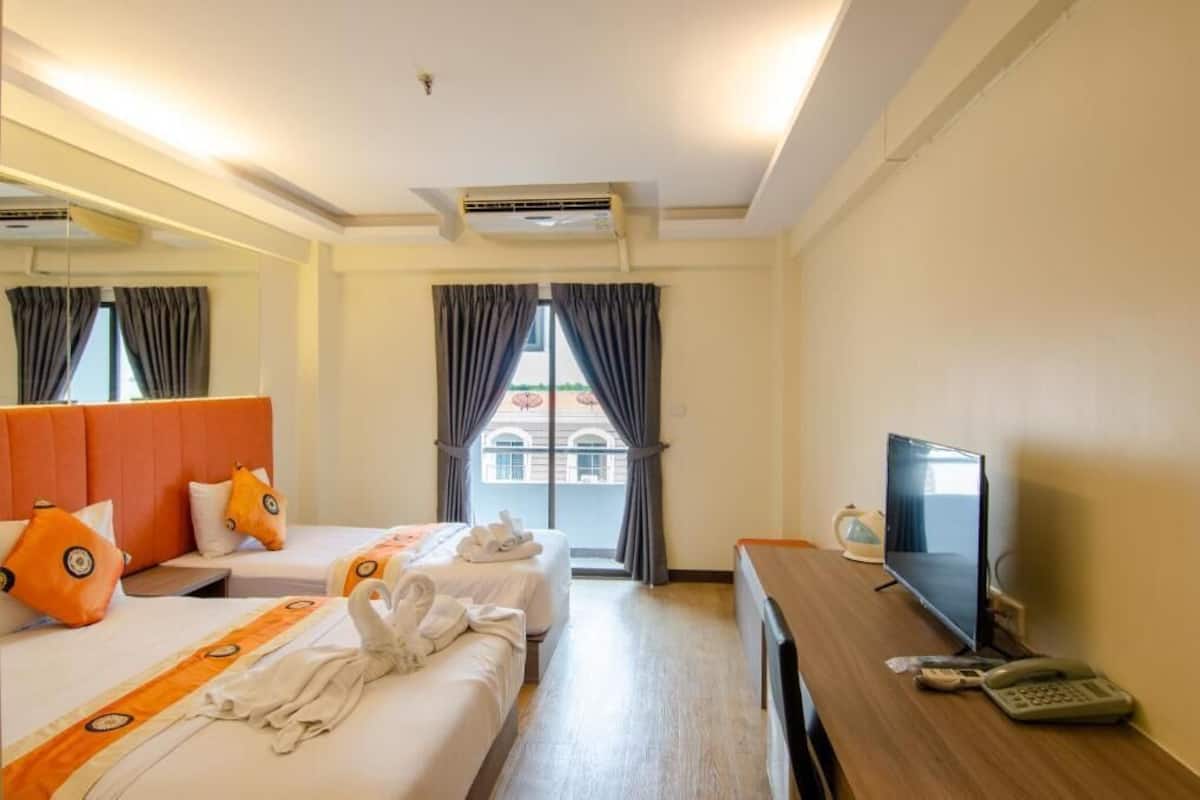 Kolmen hengen deluxe-huone | Minibaari, yksilöllisesti kalustettu, ilmaiset vauvansängyt