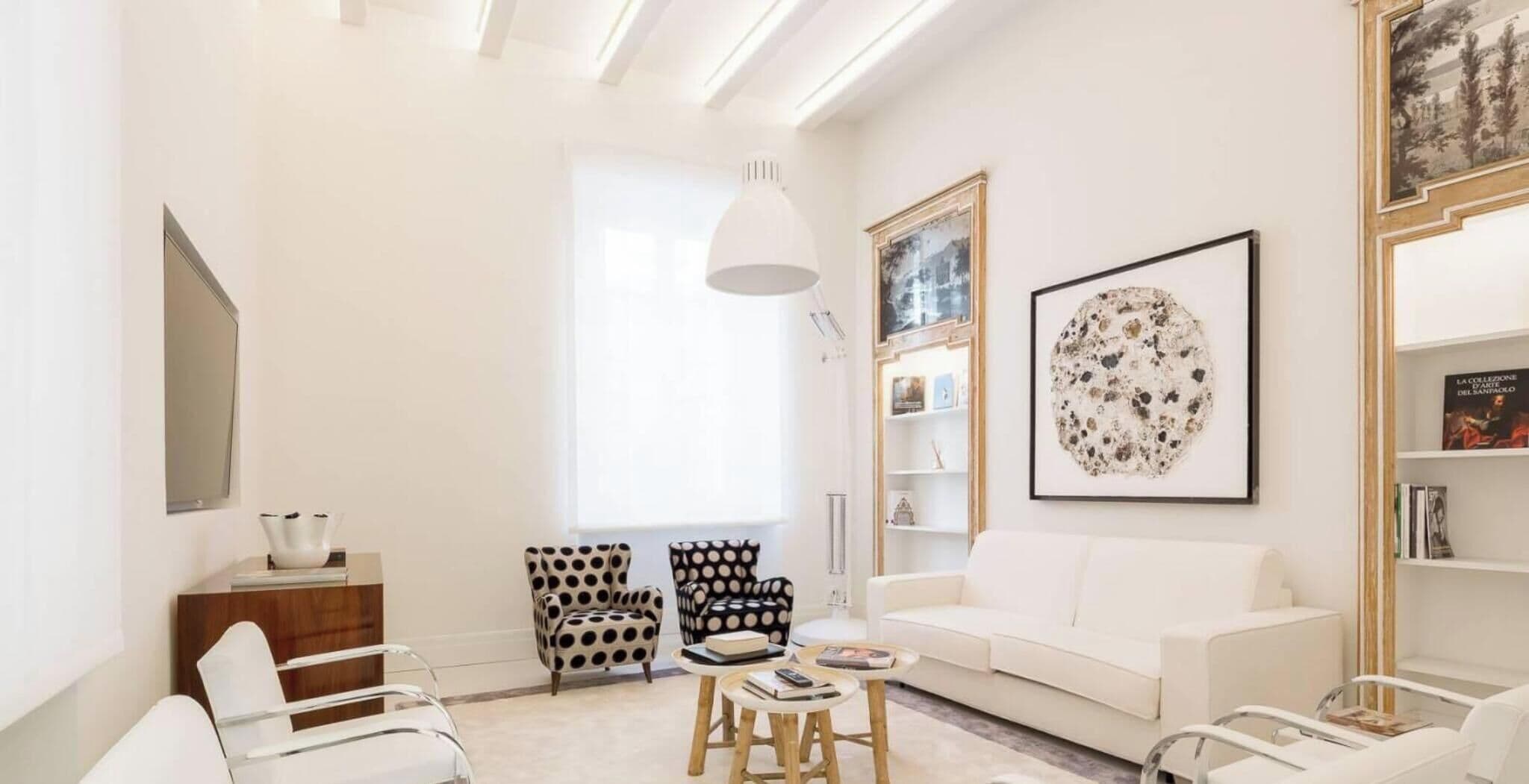 Suite Borgonovo ( Via Borgonovo 26 ) | Living area | 40-inch LCD TV with satellite channels, TV