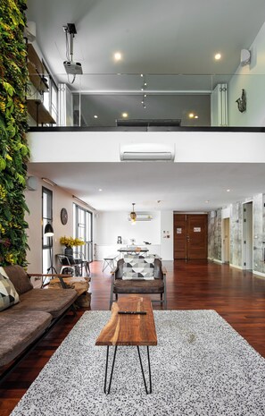 Premium Three Bedroom Duplex | Living area | 42-inch LCD TV with satellite channels