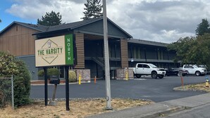 A building with a sign reading "The Varsity North" indicating an inn and studios. - Varsity North (Centralia)