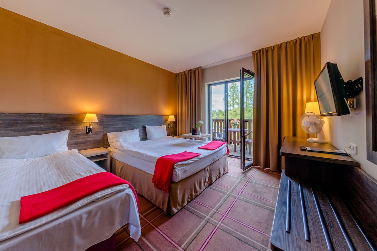 family room | in-room safe, desk, iron/ironing board, cots/infant beds