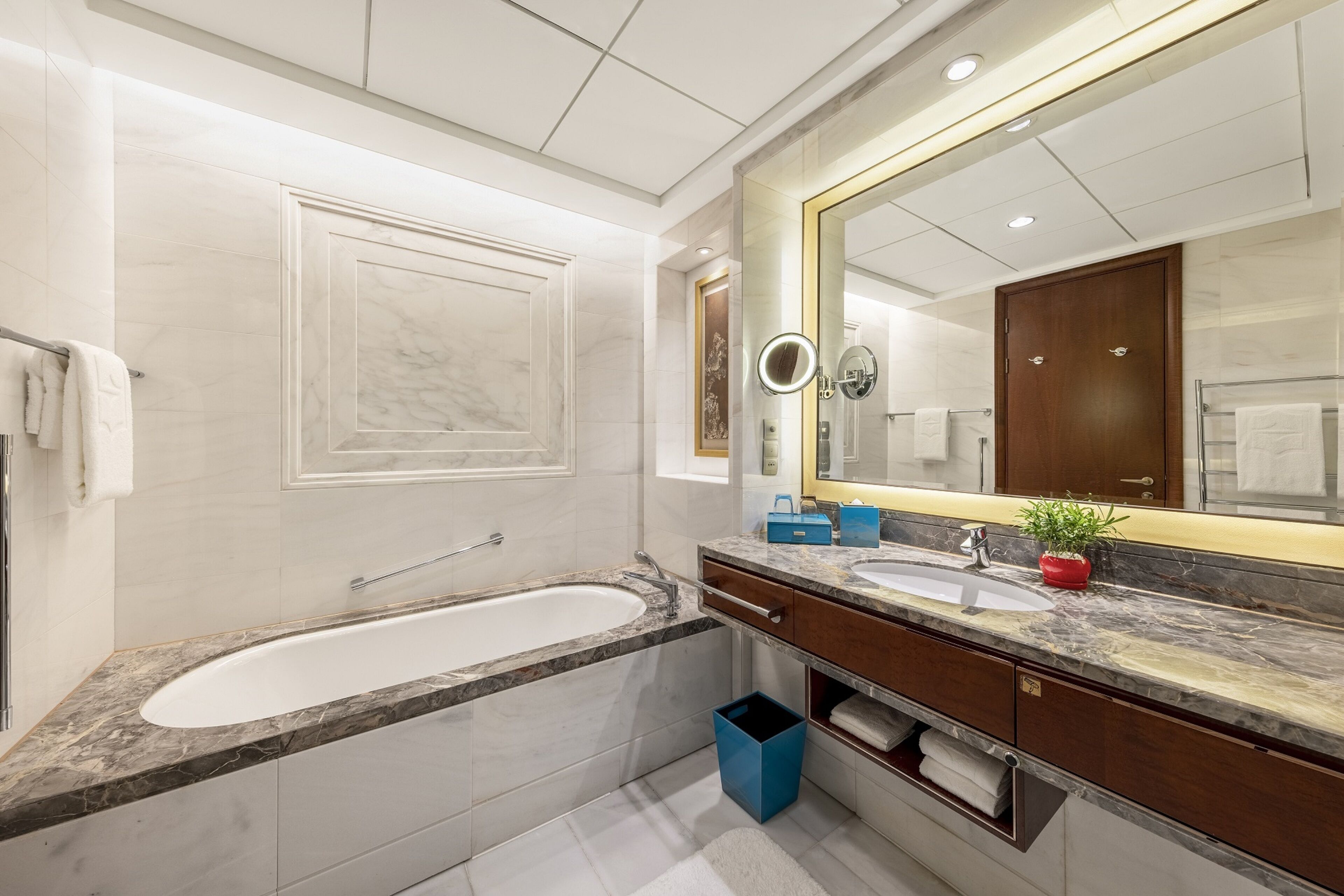 separate bathtub and shower, designer toiletries, hair dryer, slippers