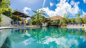 Outdoor pool, pool umbrellas, sun loungers