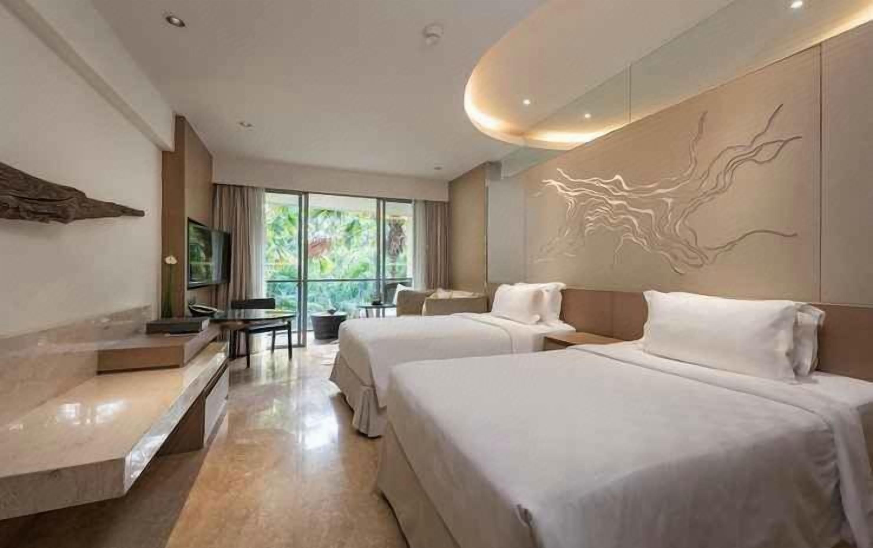 Roba de llit d'alta qualitat, minibar i caixa forta a l'habitació 