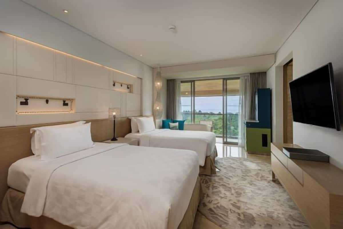 2 dormitorios, ropa de cama de alta calidad, minibar y caja fuerte