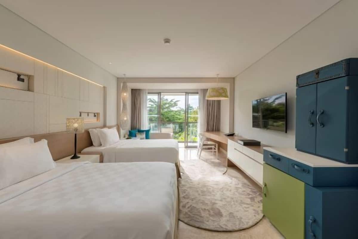 2 dormitorios, ropa de cama de alta calidad, minibar y caja fuerte