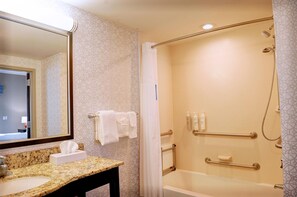 Room, 1 King Bed, Accessible | Bathroom | Combined shower/tub, towels