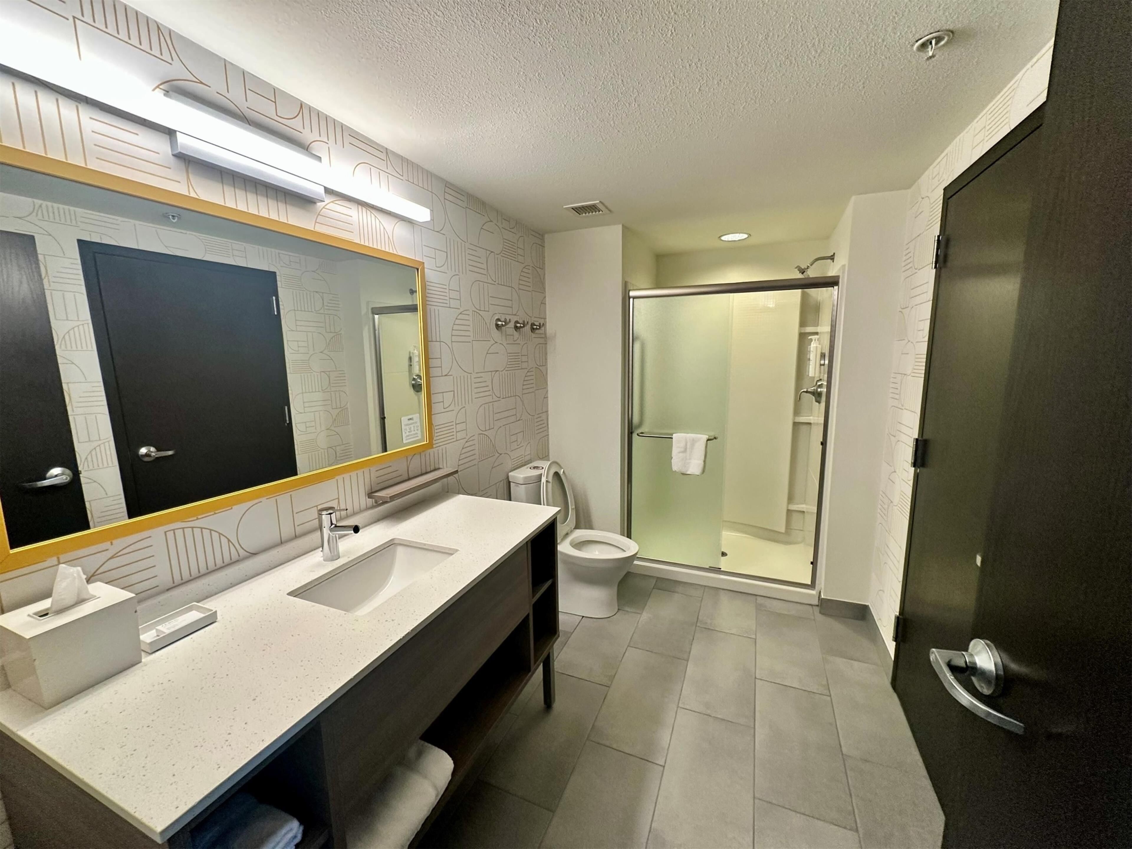 suite, 1 king bed | bathroom | free toiletries, hair dryer, towels, soap