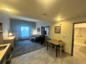 Suite, 1 King Bed | Living area | LCD TV, MP3 dock