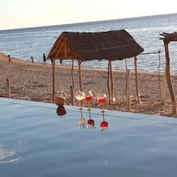 Private beach, white sand, sun-loungers, beach umbrellas